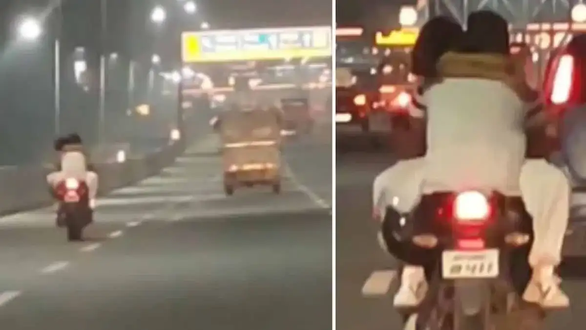 Viral Video: प्रेमी जोड़े ने चलती बाइक पर किया रोमांस, देखें वीडियो 1 ajab gajab video