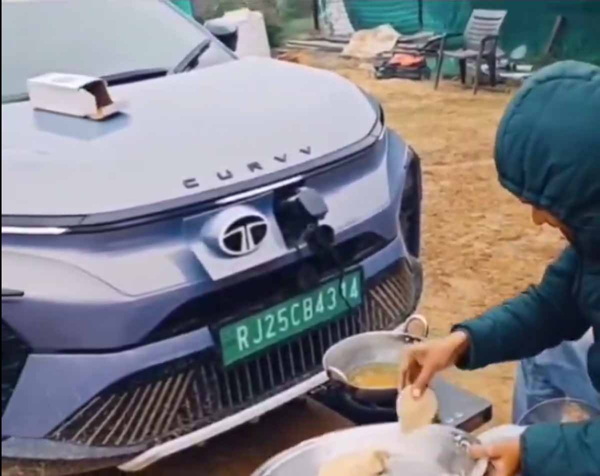 Viral Video: TATA Curvv EV कार से तल दी शख्स ने पुड़ी, देखें वायरल वीडियो 1 Viral Video In Tata curvv with puri
