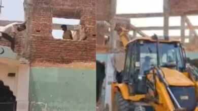 MP MADARSA BUILDOZER